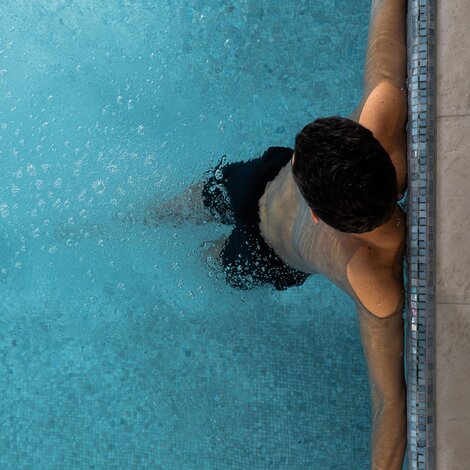 man in outdoor pool