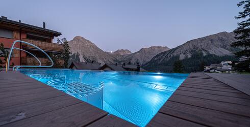 Pool in the mountains hotel with infinity pool Switzerland