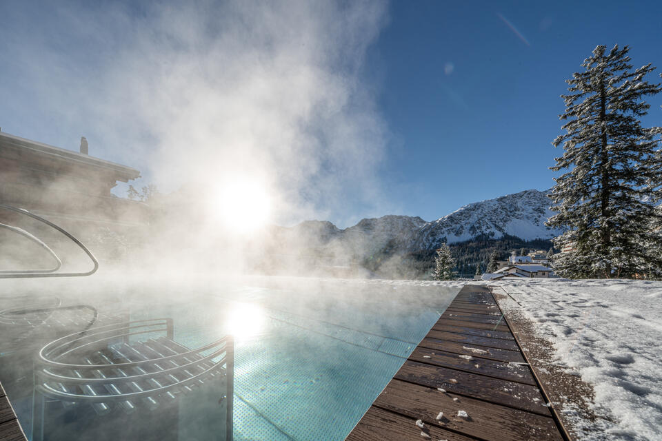 infinity pool in the Swiss mountains