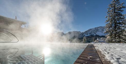 infinity pool in the Swiss mountains